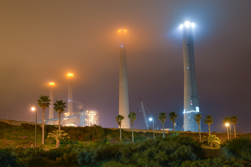 an Israeli power plant Orot Rabin in Hadera at a foggy night