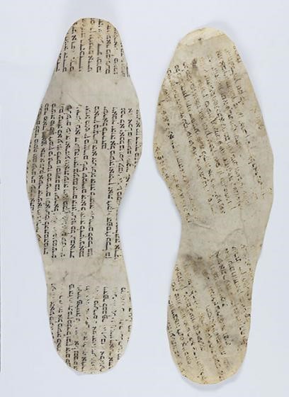 Shoe insoles made from Torah scrolls.